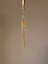 Load image into Gallery viewer, Transparent resin bookmark featuring delicate mustard flowers and golden tassel for readers