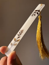 Load image into Gallery viewer, Elegant clear resin bookmark featuring real leaves and a golden tassel, a unique handmade gift for readers