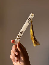 Load image into Gallery viewer, Botanical resin bookmark with preserved leaves and gold tassel, perfect for gifting or personal use