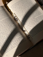 Load image into Gallery viewer, Nature-inspired bookmark with real leaves in resin and a gold tassel, perfect for gifting and personal use