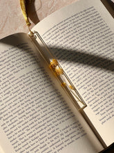 Load image into Gallery viewer, Nature-inspired bookmark with preserved mustard flowers in resin, available at ShopKuhoo.