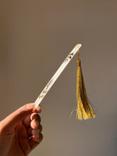 Load image into Gallery viewer, Eco-friendly resin bookmark with pressed leaves and gold tassel, ideal for bookworms and nature enthusiasts.