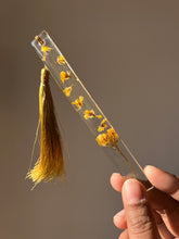 Load image into Gallery viewer, Real mustard flower resin bookmark with minimalist design and golden tassel by ShopKuhoo.