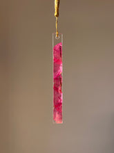 Load image into Gallery viewer, Artisanal resin bookmark with pink Bougainvillea petals and gold tassel, ideal for nature-themed gifts and book accessories.
